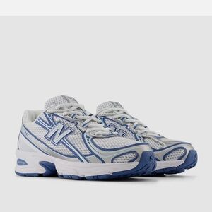 New Balance White and Blue Athletic Sneakers